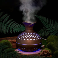 Difusor humidificador con diseño de jarrón y luz de color