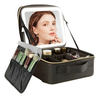 Maletín cosmetiquero abierto con espejo de luz LED y bolsillo para brochas